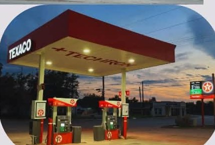 Gas Station, North Fort Worth Corridor: Pumps at dusk